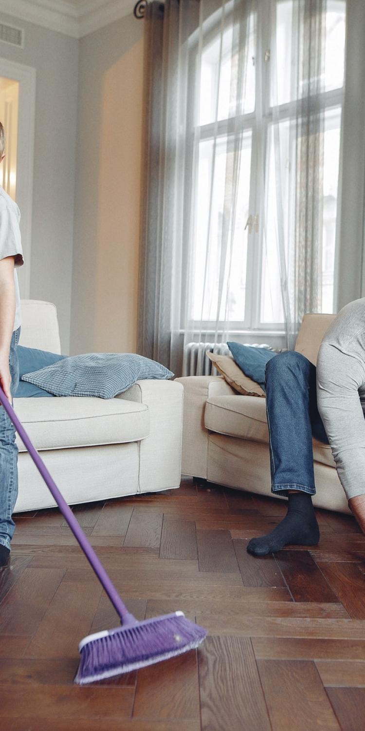 Photo of man and boy cleaning