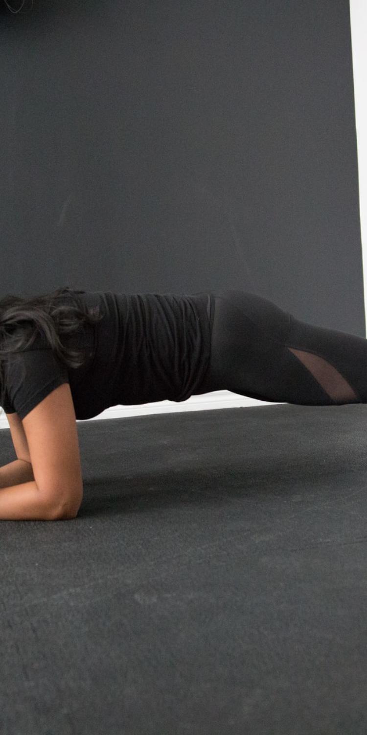 Woman doing plank exercise