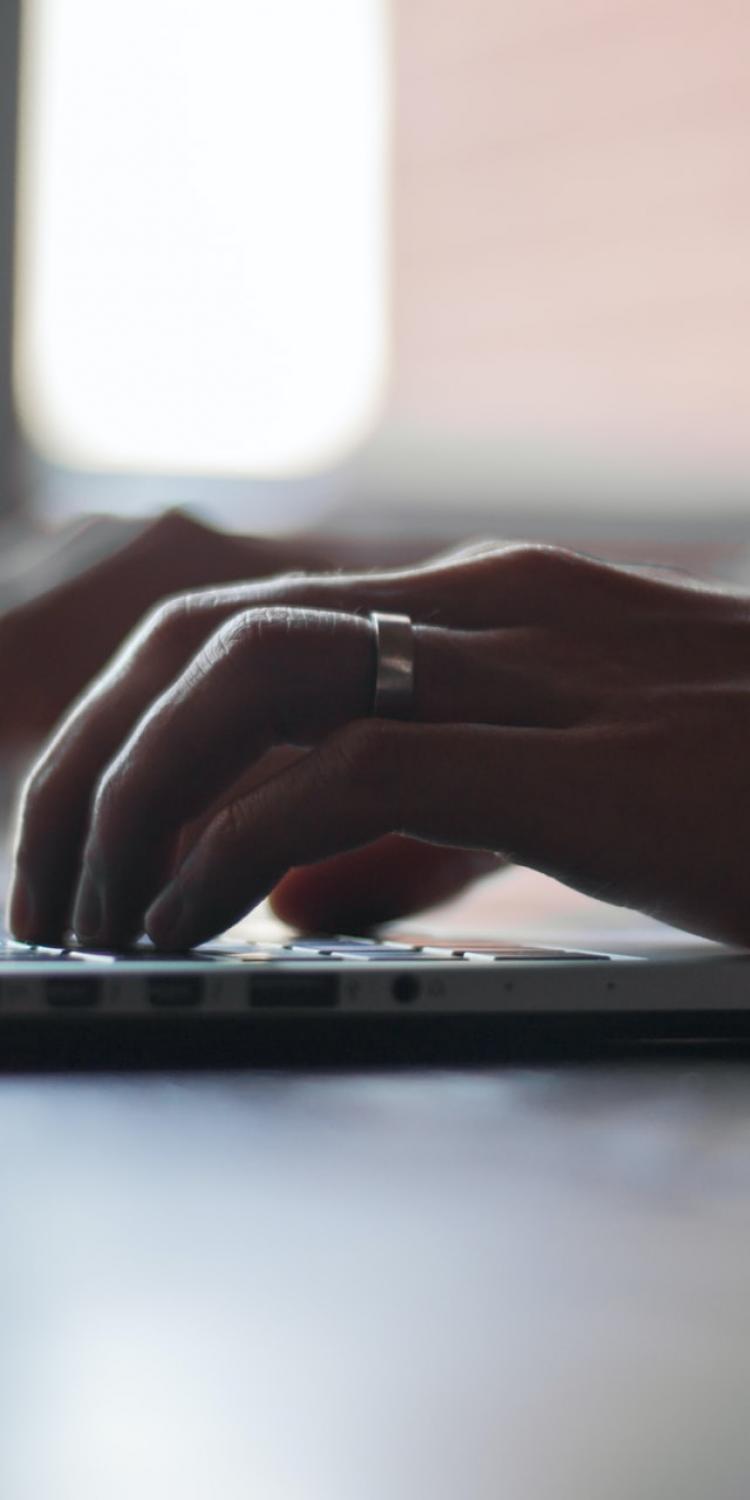 Person using laptop computer