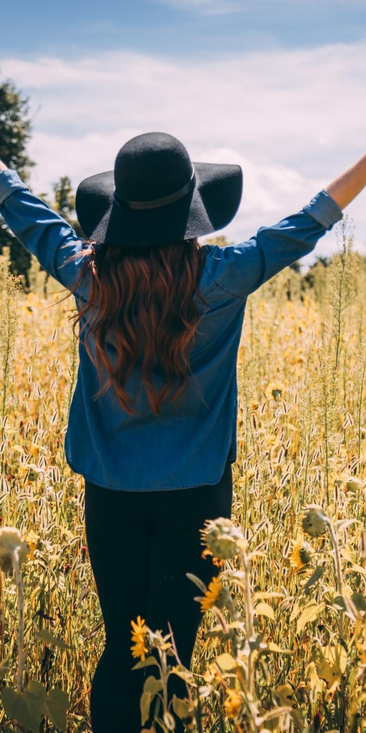 Woman standing in field