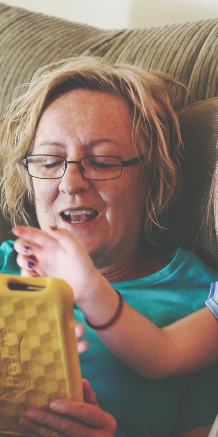 Grandma and girl using tablet