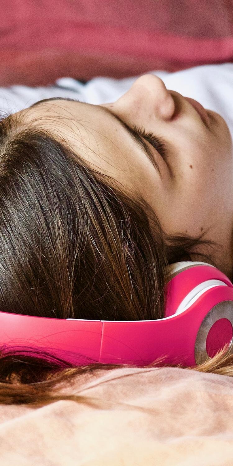 Girl resting on bed