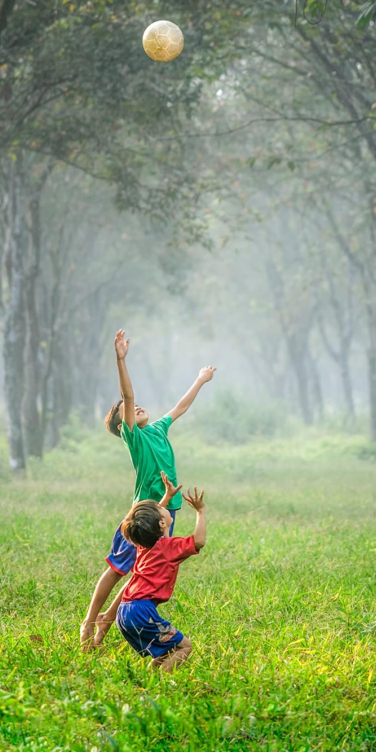 Boys playing soccer