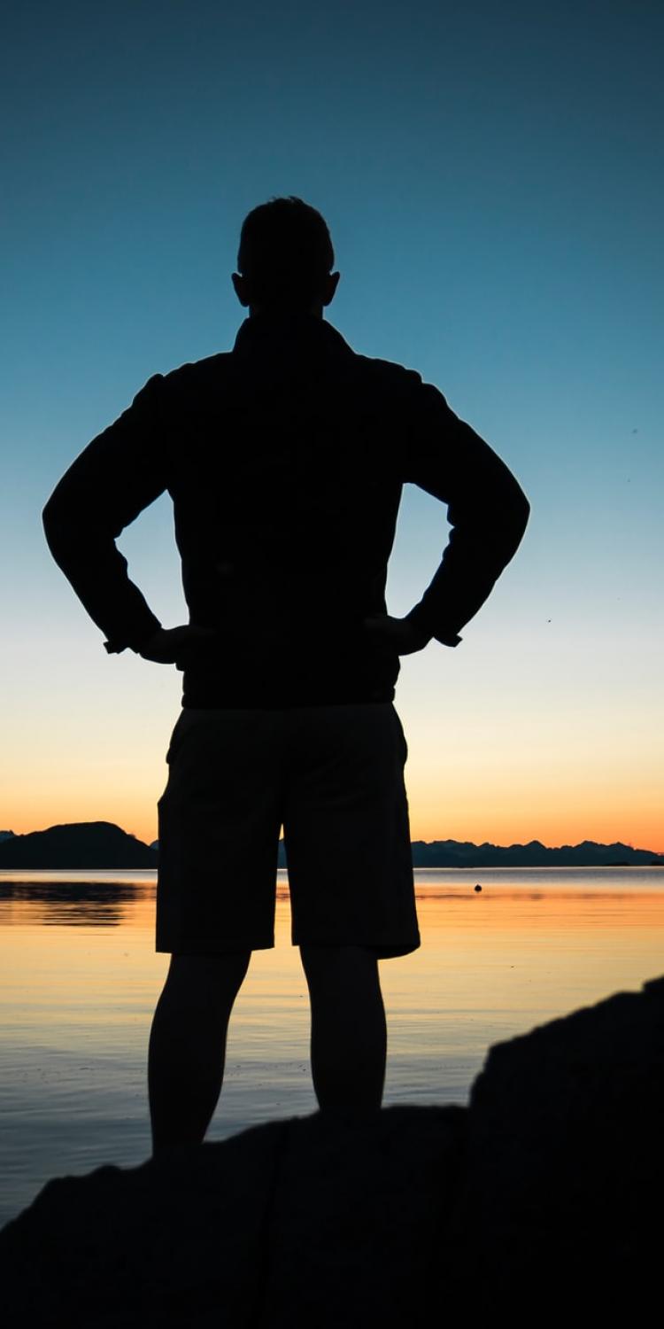 Man standing near water