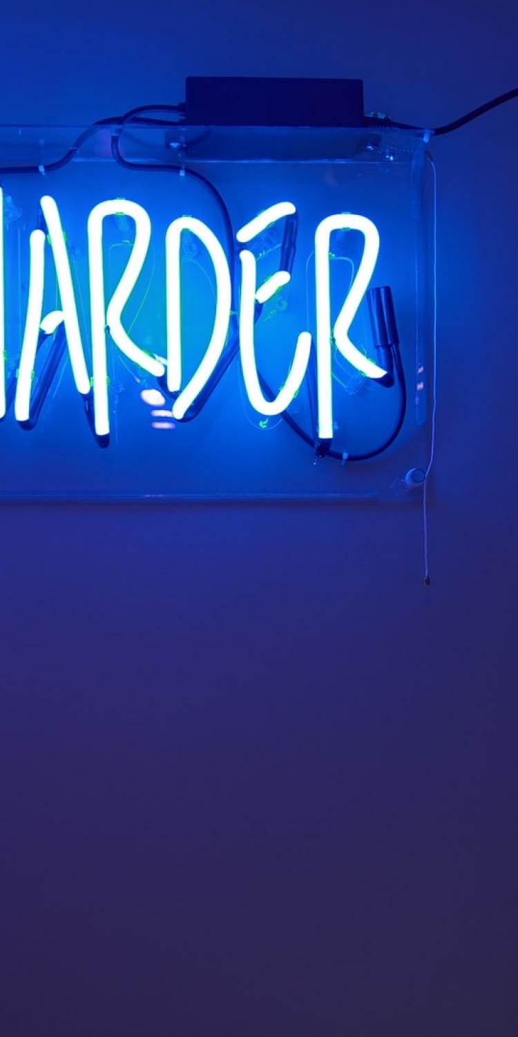 Work harder neon sign