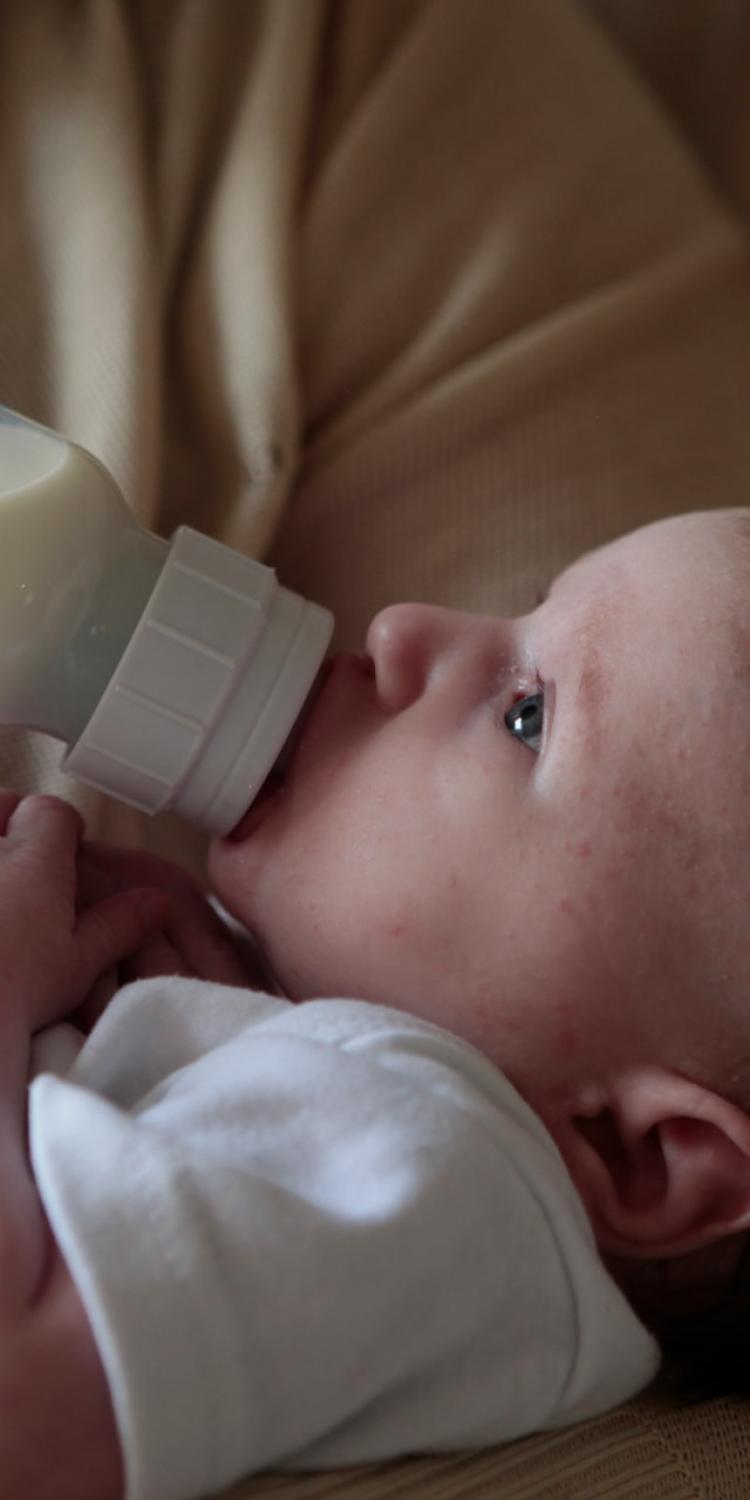 Baby drinking from bottle