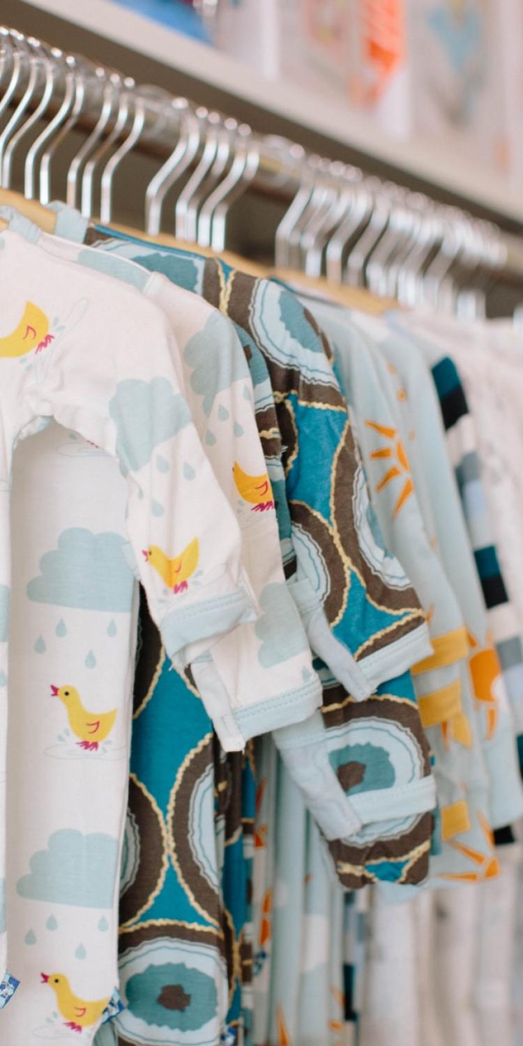 Baby clothes on hangers