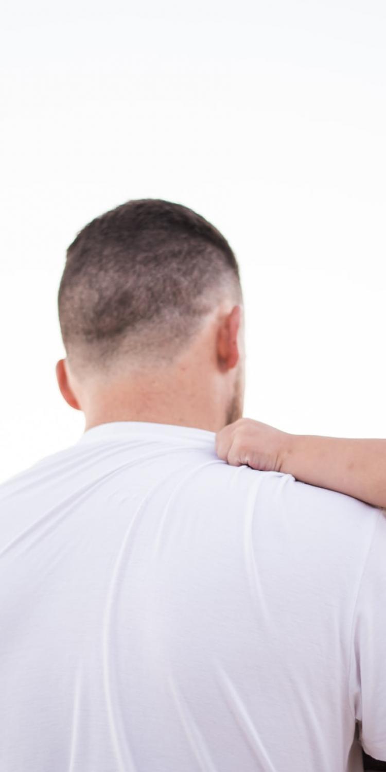 Man holding a baby