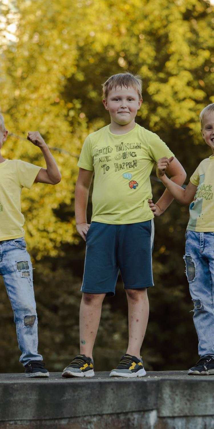 Three boys standing together