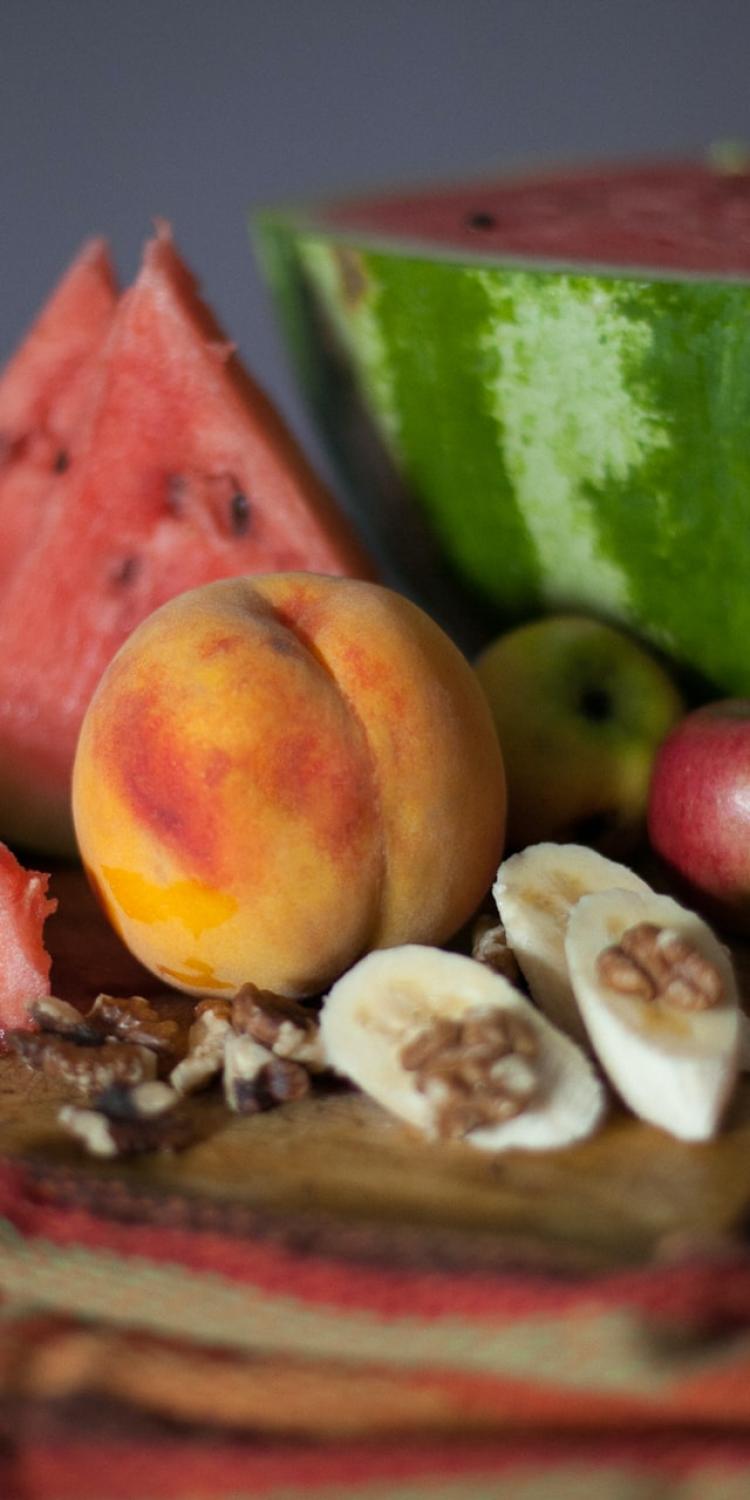 Several fruits on a cutting board