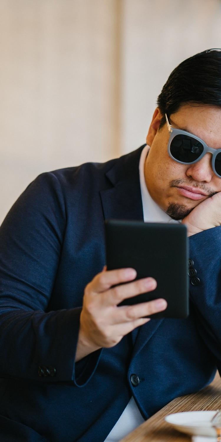 Man reading an e-reader