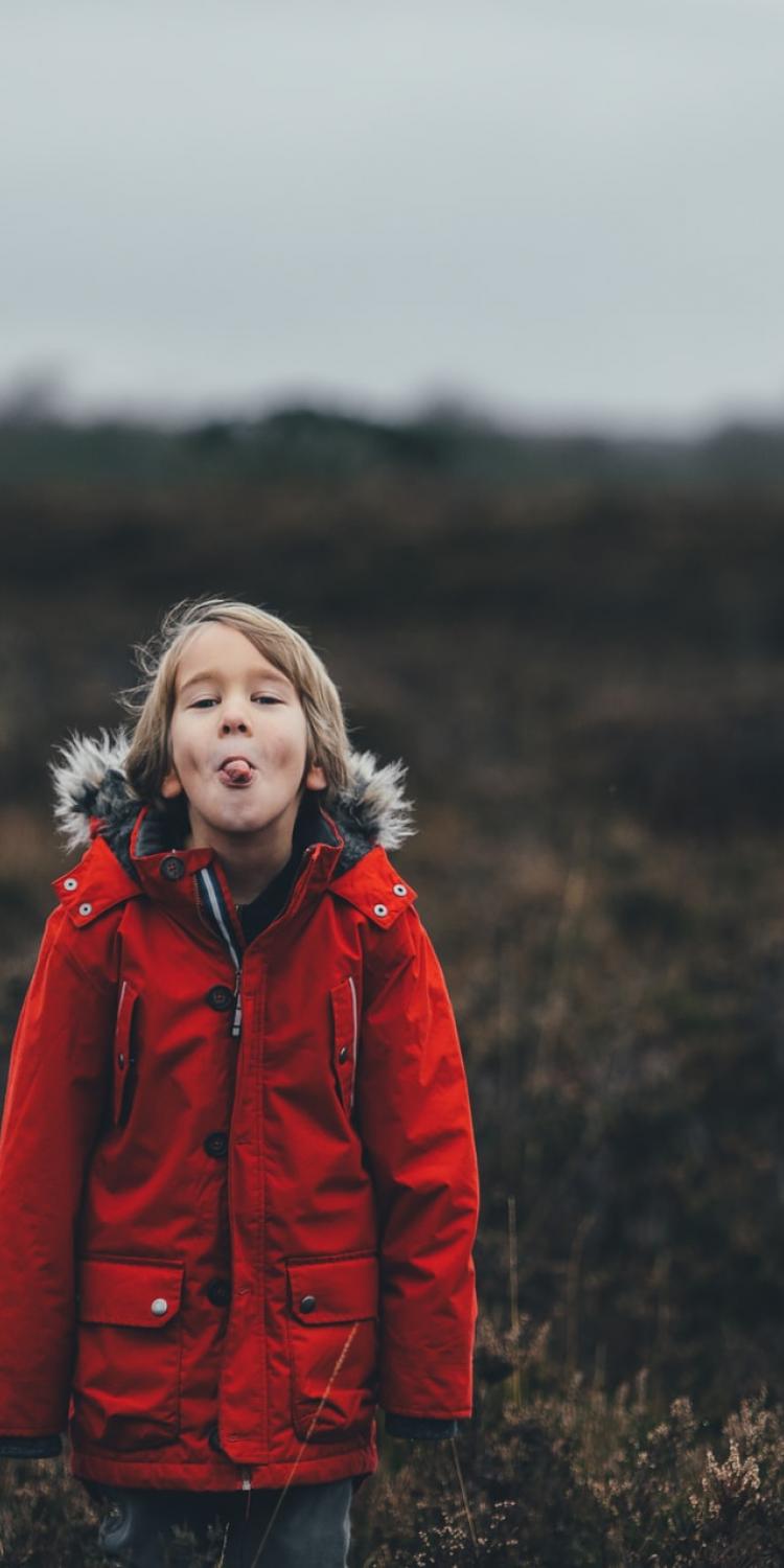 Child sticking tongue out