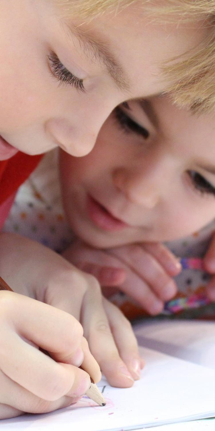Two kids coloring