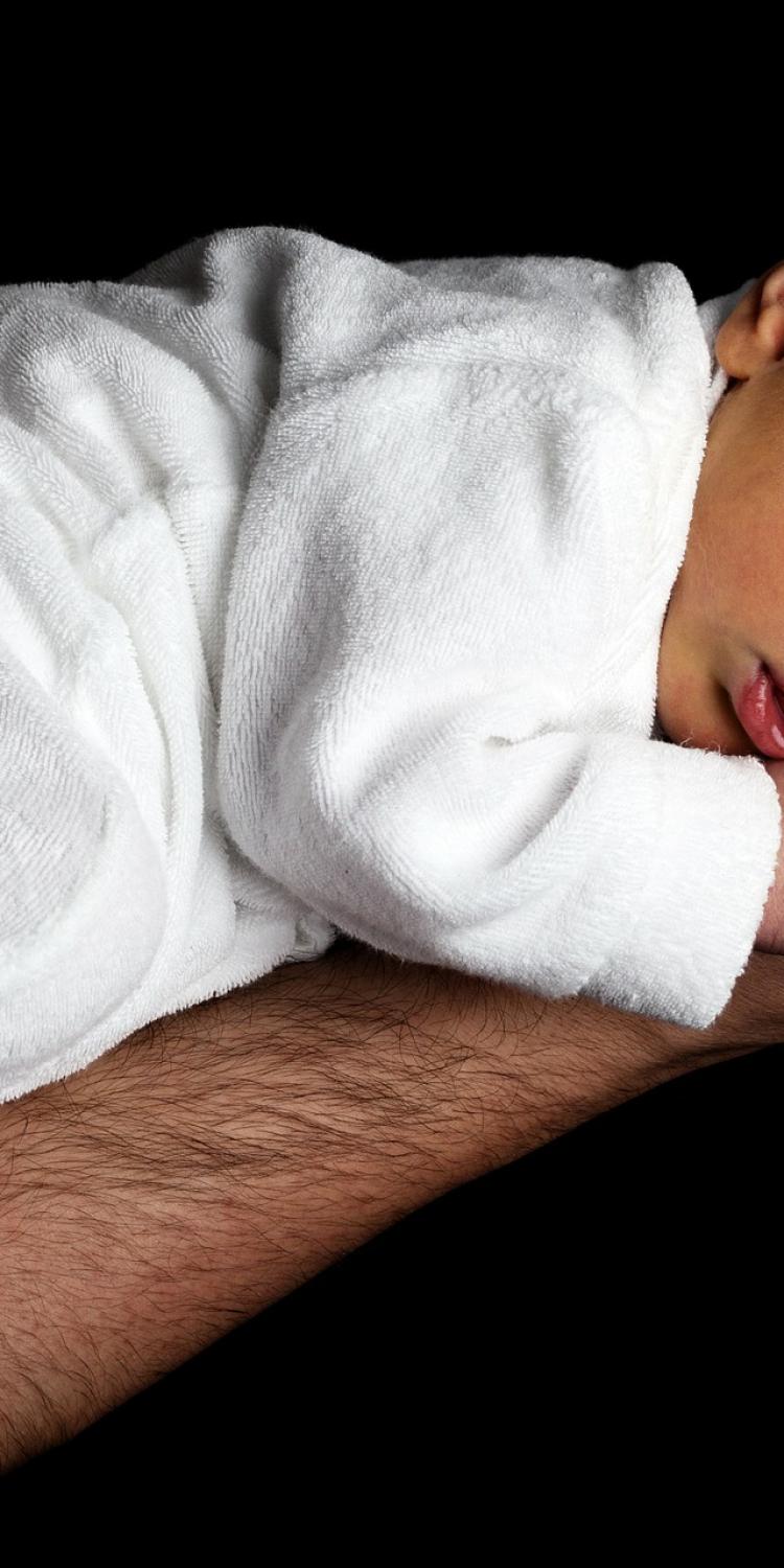 Newborn baby on hand