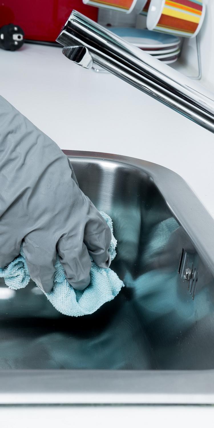 Washing the sink