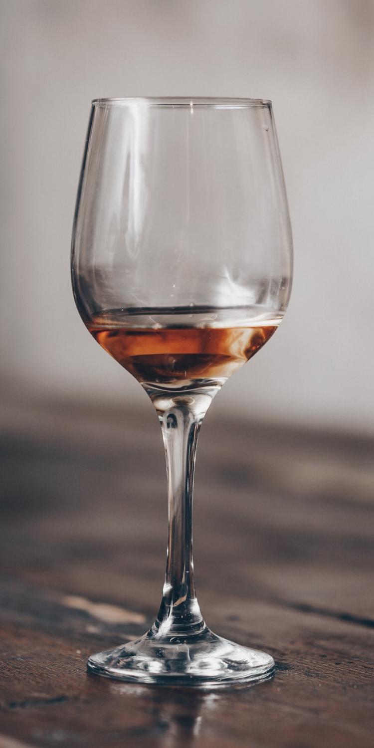 Clear wine glass on table