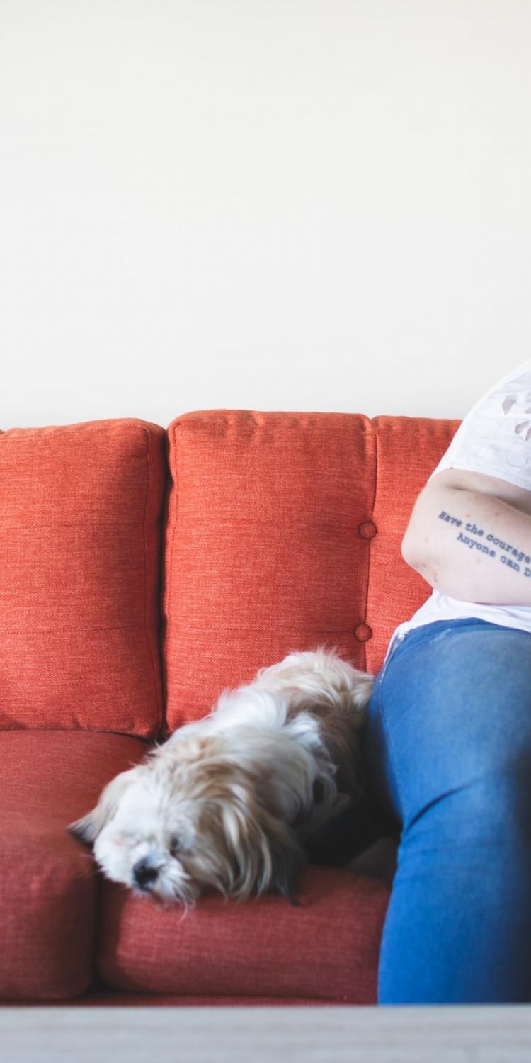 Woman reading on couch