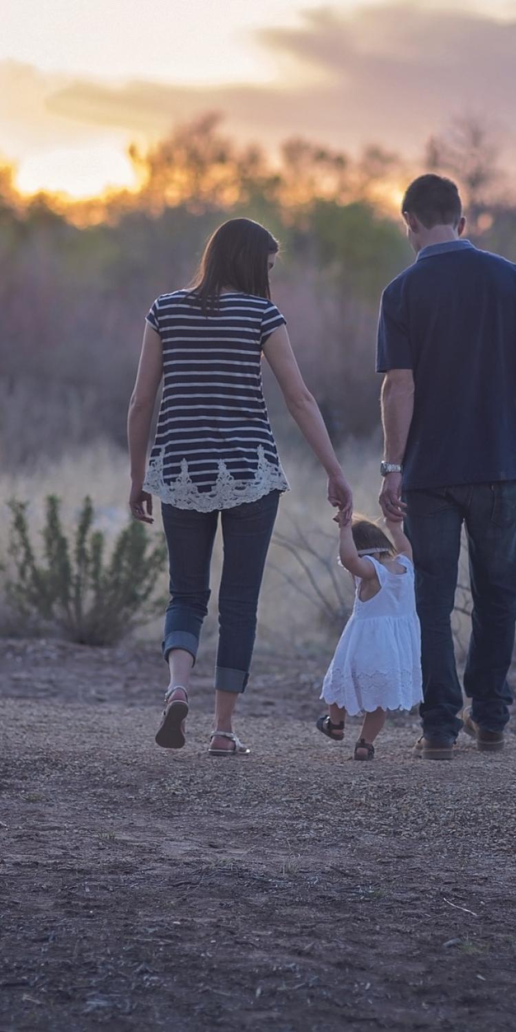 Two parents with a child