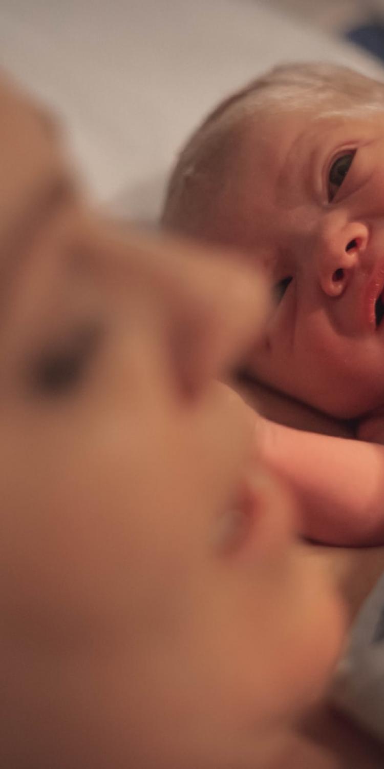 Newborn baby with mother