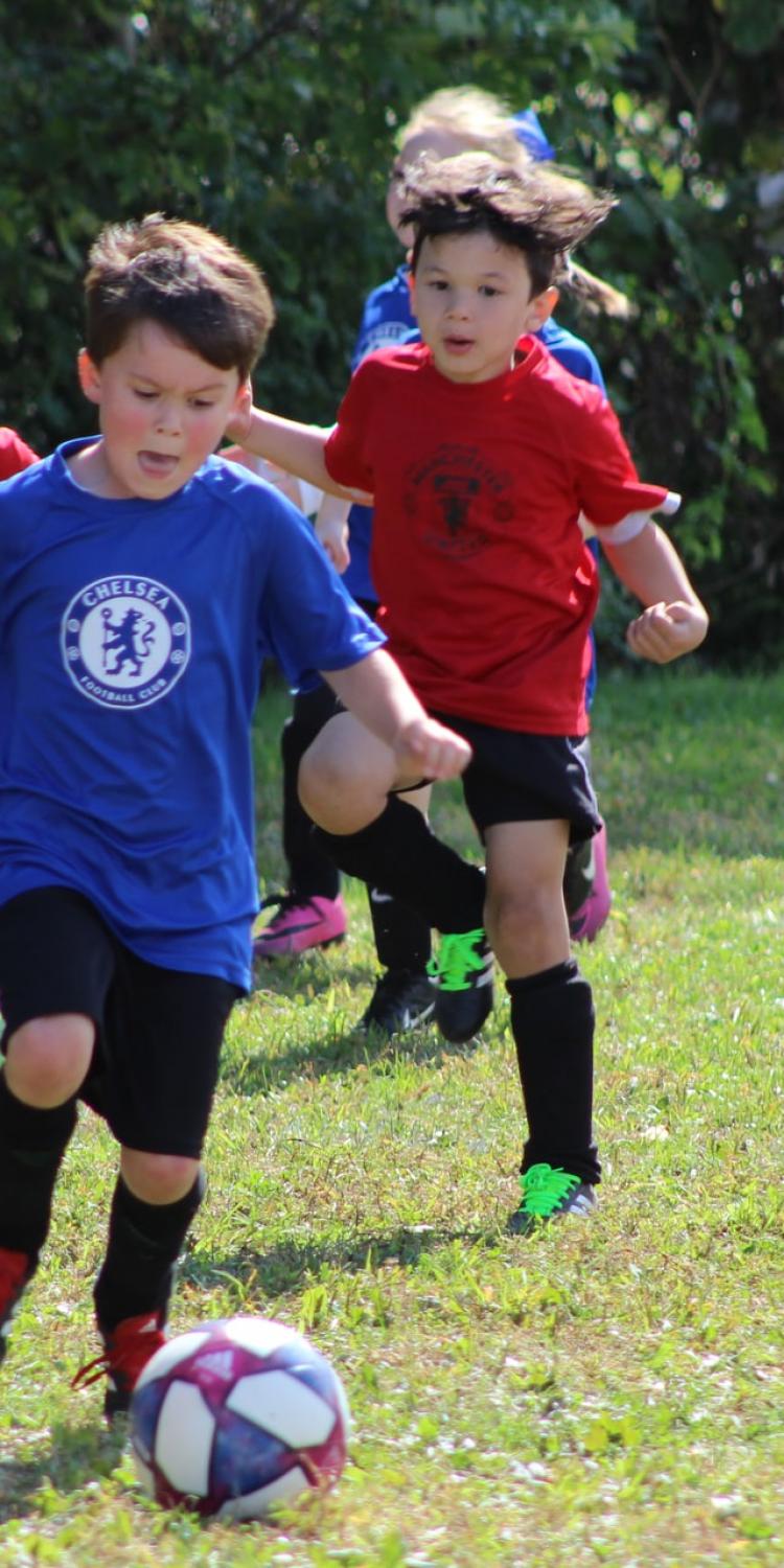 Kids playing soccer