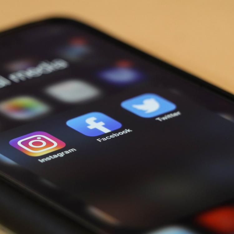 Phone with social media icons